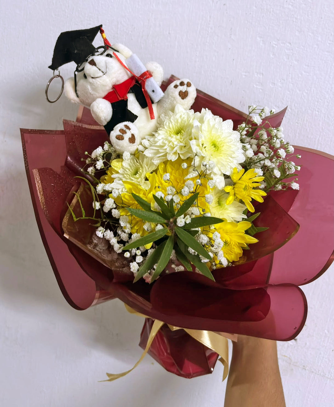 Graduate-Joy-bouquet-in-hand-DodoMarket-delivery-Mauritius
