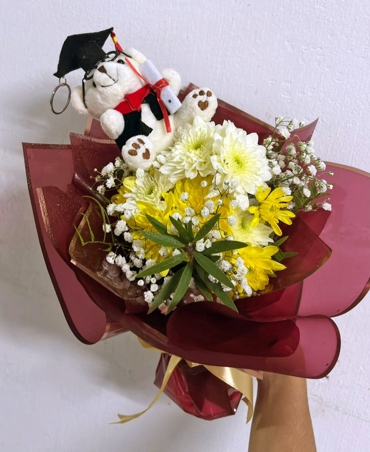 Graduate-Joy-bouquet-in-hand-DodoMarket-delivery-Mauritius