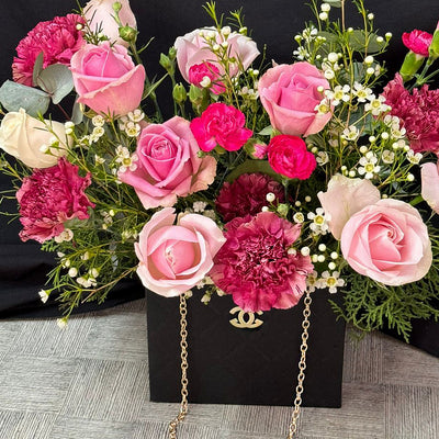 Imported-roses-mix-flowers-black-bag-2024-close-DodoMarket-delivery-Mauritius