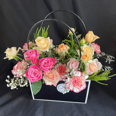 Imported-roses-mix-flowers-in-classy-black-bag-DodoMarket-delivery-Mauritius