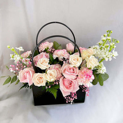Imported-roses-flowers-in-black-bag-DodoMarket-delivery-Mauritius