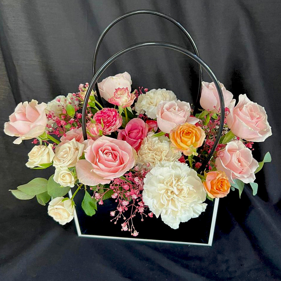 Imported-roses-flowers-in-classy-black-bag-DodoMarket-delivery-Mauritius