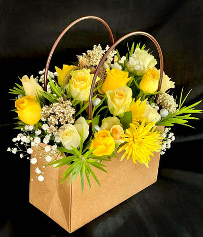 Yellow-mixed-flowers-bouquet-in-craftbag-Warm-regards-Dodomarket-delivery-Mauritius